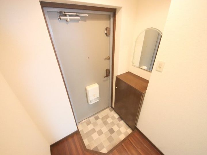 シティパレス生駒谷田町P7の玄関
