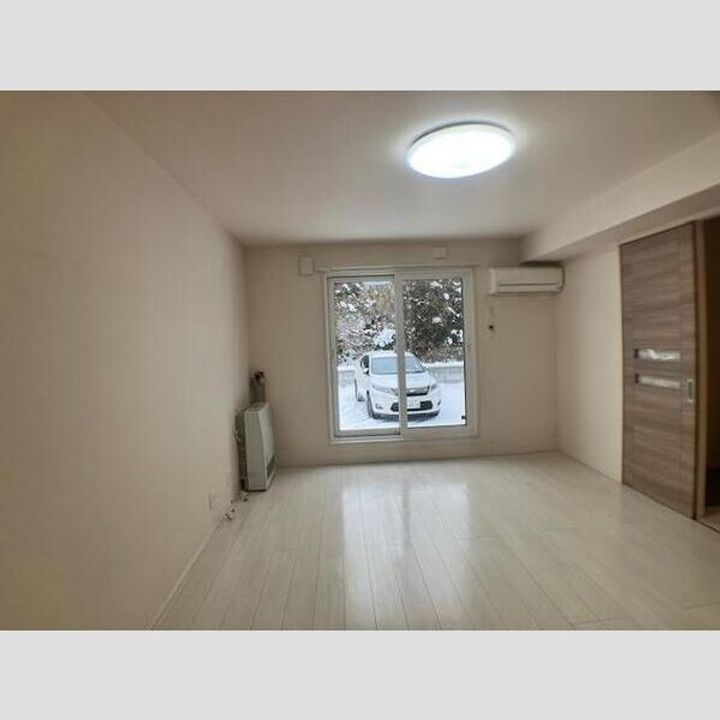 北海道札幌市北区北二十二条西8(マンション)の賃貸物件の居間