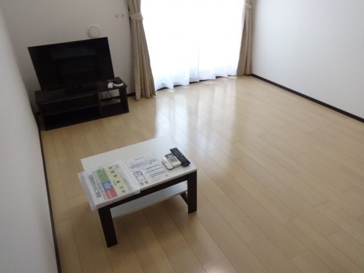 沖縄県名護市字豊原(アパート)の賃貸物件の居間