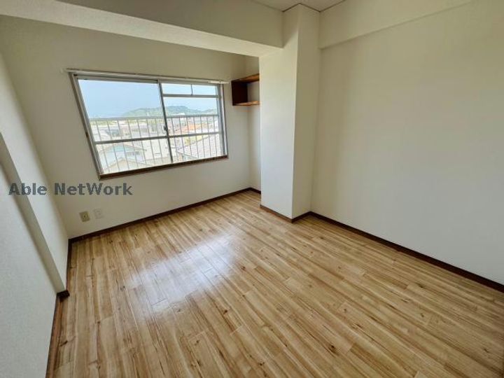 徳島県阿南市見能林町下志んじやく(マンション)の賃貸物件の居間