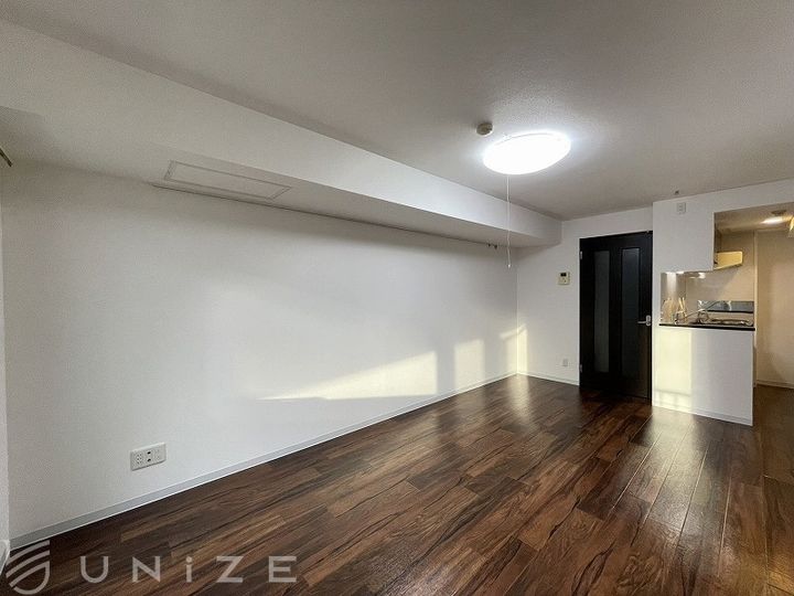 北海道札幌市豊平区豊平九条9(マンション)の賃貸物件の居間