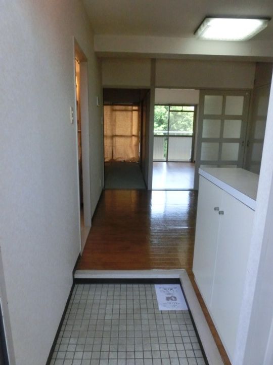 飯田マンションの玄関