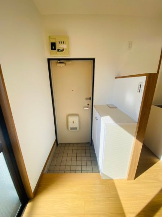 メゾンド文教の玄関