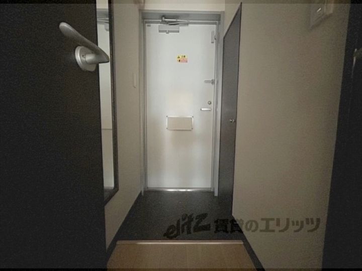 レオネクストみやこ385の玄関