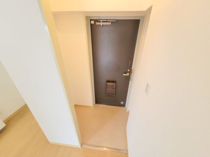 ロイヤルハイツ東生駒の玄関