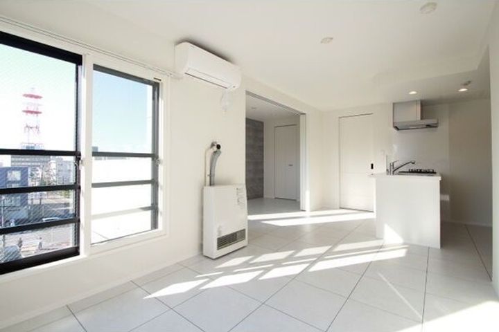 北海道札幌市白石区本郷通8丁目南(マンション)の賃貸物件の居間