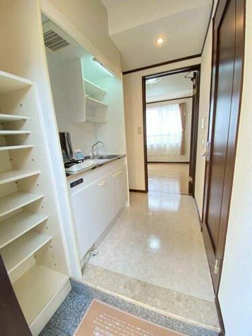 ハートヒルズ西大友の玄関