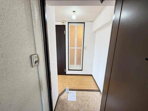 プチマンション江南の玄関