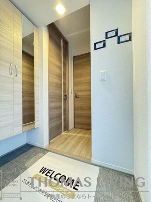 ストレイト葛葉301の玄関