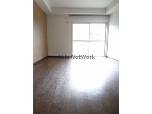 エスポワール岩湧102の居間