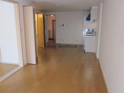 グリーンハイツ芝2206の居間