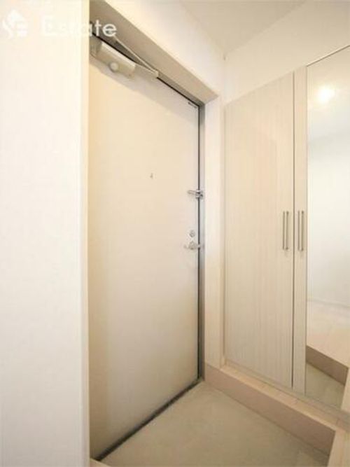 ハーモニーテラス木之免町101の玄関