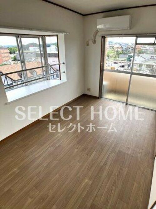 リバーサイド八番館401の居間