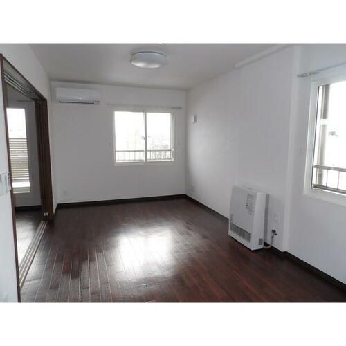 北海道札幌市豊平区月寒東二条3丁目(マンション)の賃貸物件の居間