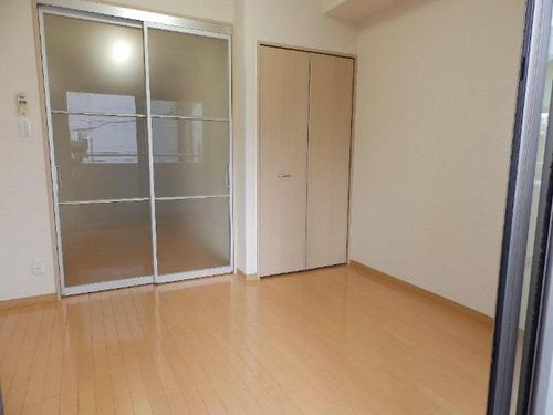 プロビデンス栄南302の居間