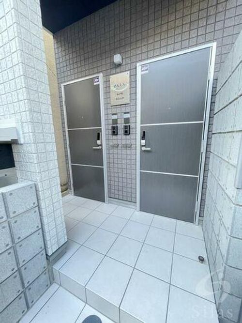 あんしん+HouM浜寺石津15-1001の玄関