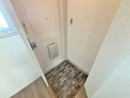 松川マンションの玄関