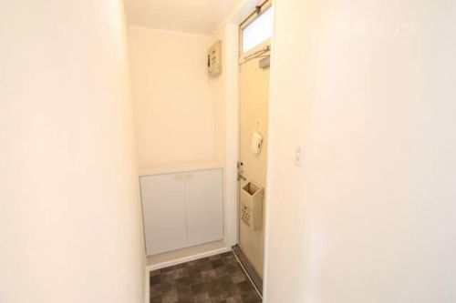 ハイツもくせい102の玄関