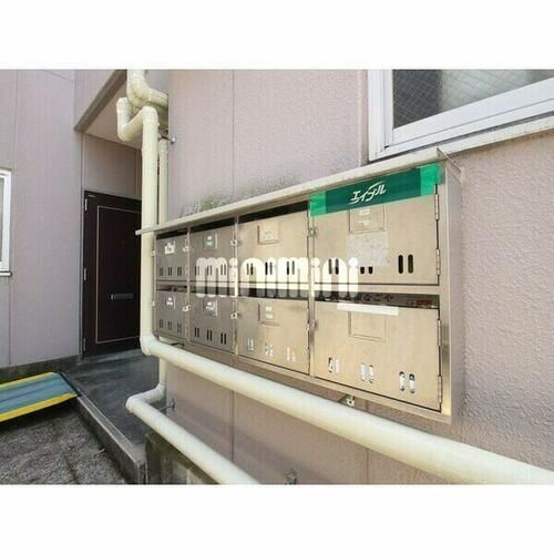 メゾンシエテ202の玄関