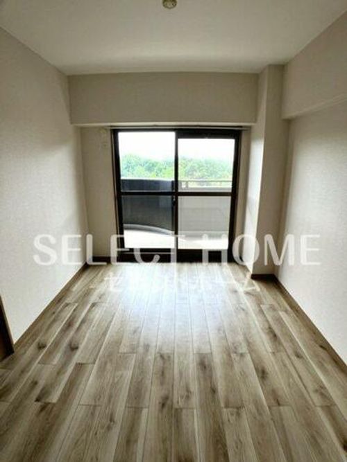 天神山マンションⅡ号館301の居間