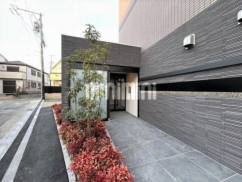 郷前町2丁目マンション101の玄関