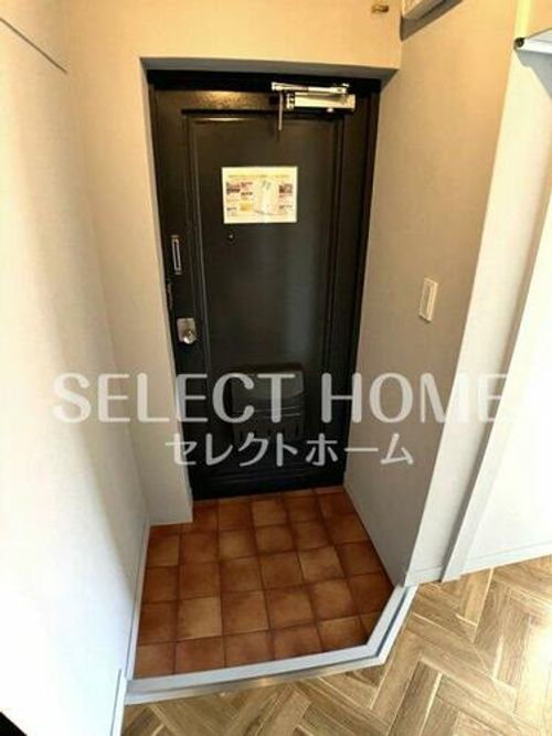 鶴田マンション202の玄関