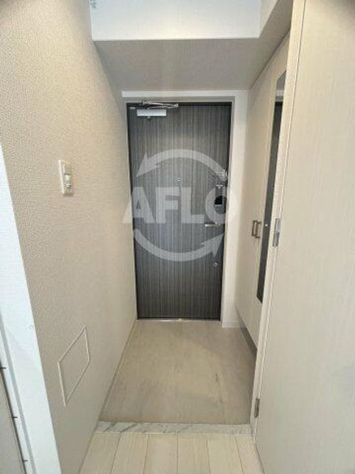 エスリード弁天町桜通レジデンスの玄関