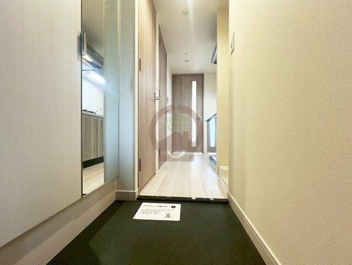 プレサンス福島吉野ミナージの玄関