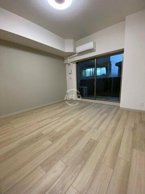 プレサンス堺筋本町エグゼブランの居間