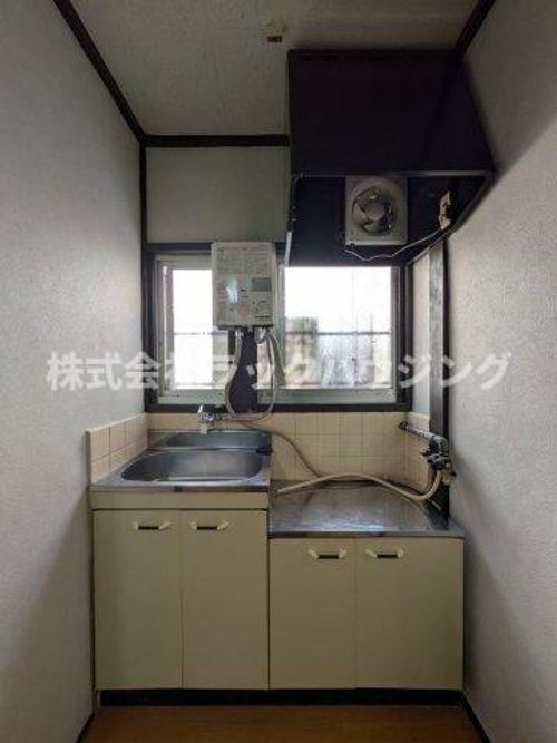 大阪府寝屋川市田井西町(テラスハウス)の賃貸物件のキッチン