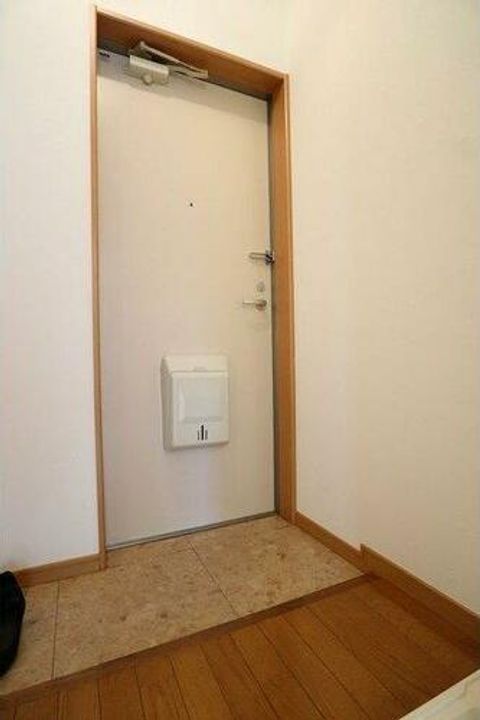 エクシードM・T・R202の玄関