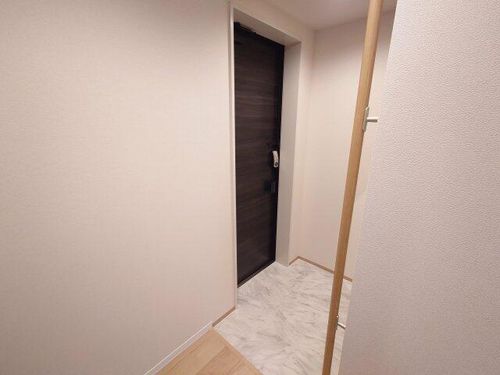 シャーメゾンガーデンズ芦屋浜町209の玄関
