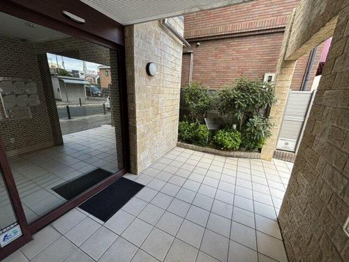 グランデージ池田栄本町503の玄関