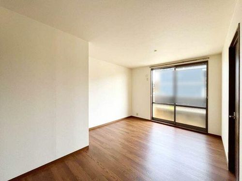 シティパレスIIA102の居間