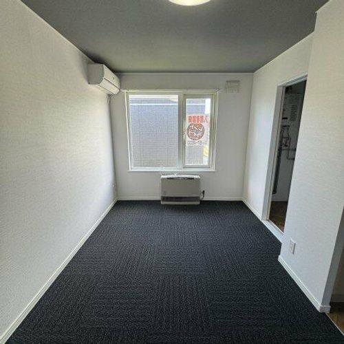 ハイツアビーロード204の居間