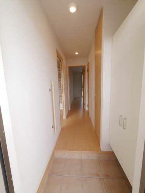 シャーメゾンひびきのIIの玄関