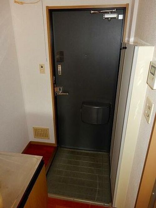 MINORUハイツ202の玄関