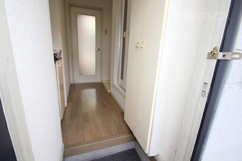 プライム八田204の玄関