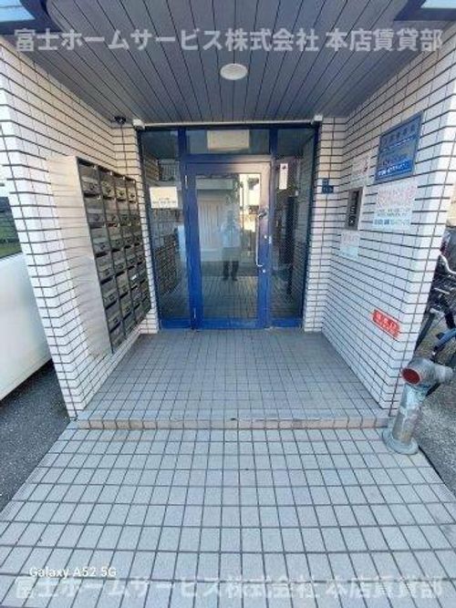 メゾンド針中野405の玄関