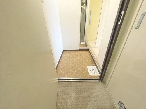 大阪府大阪市都島区高倉町1丁目(マンション)の賃貸物件の玄関