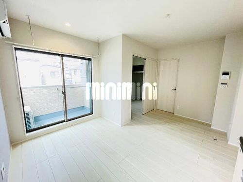 クロシェット庄内通103の居間