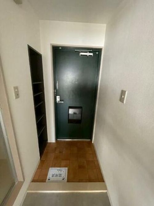 エイチ・ツー・オー河内長野210の玄関