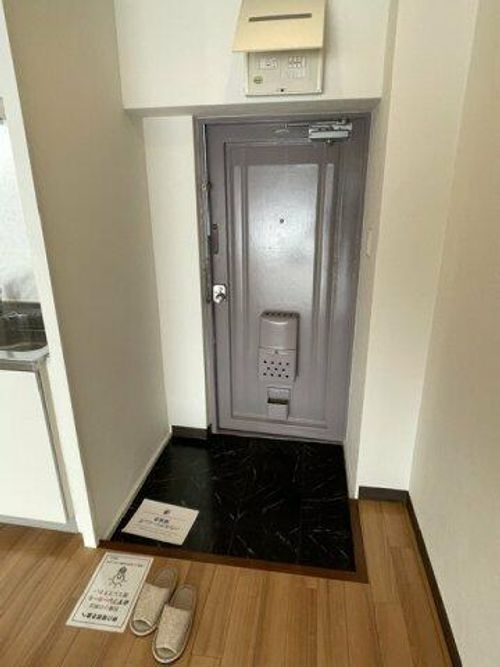 スギタ今福北ハイツの玄関