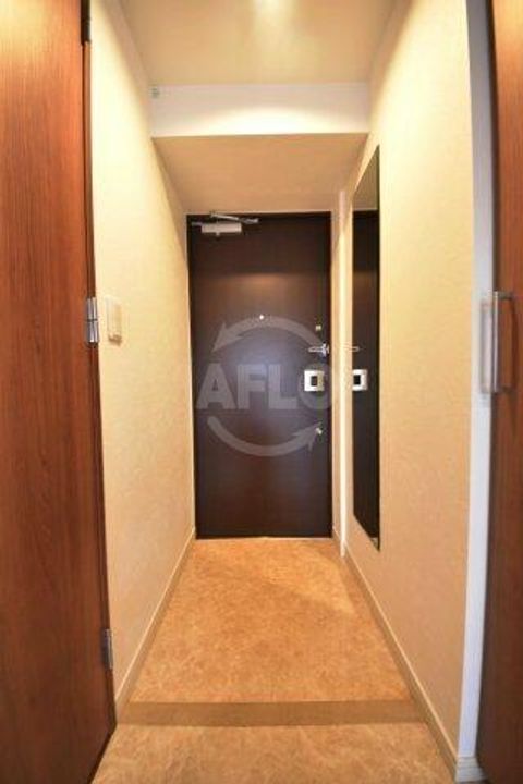 ジュネーゼグラン福島ミラージュの玄関