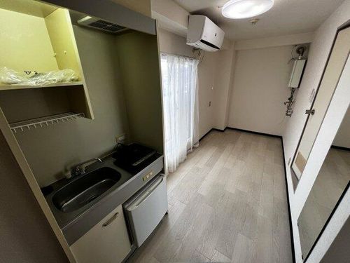 グランドハイツ湯里621の居間