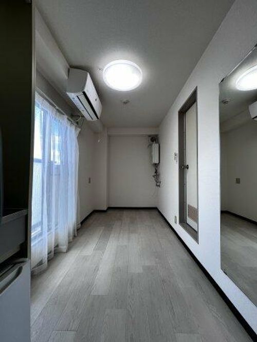 グランドハイツ湯里621の居間