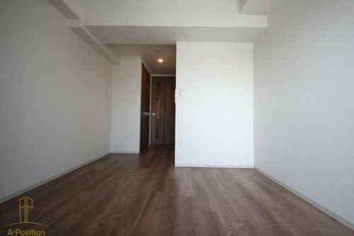 ファーストフィオーレ九条の居間