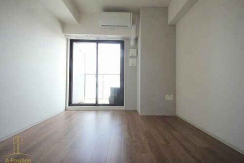 ファーストフィオーレ九条の居間