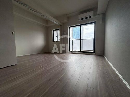 コンフォリア・リヴ新大阪西宮原ソルテラスの居間