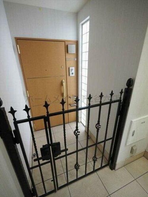 NS上町セブンの玄関